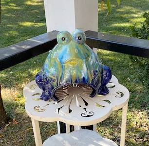 Our Frivolous Frog Toad Abode Garden Statuary is sure to make a splash in any garden! Each colorful ceramic creature has fascinatingly large eyes that draw you in and a unique marbling of blues, greens, yellows, and whites down its body.