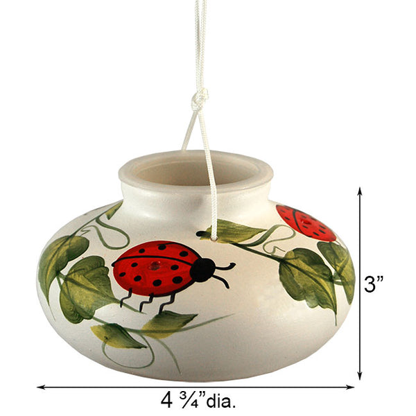 Our Ladybug Handcrafted Ceramic Hummingbird has been beautifully handcrafted and hand painted work of art, hummingbird feeder. It holds approximately 10 ounces of nectar and can be hung from a branch or a hook by the attached nylon cord.  It features 3 feeding ports which are located in the middle of each ladybug.