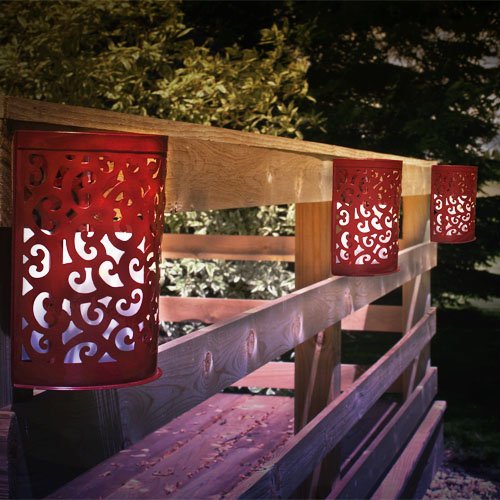 Our Rusty Red Etched Metal Indoor/Outdoor Wall Sconce Lanterns with Flameless Candles are sold as a set of 2. They can be used individually or together to light up a space that reflects and creates interesting patterns with light and shadows