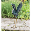 Our Seaside Blue Metallic Crane Metal Yard Art Sculpture is exceptionally beautiful, life-sized. This medium Crane features brilliant blue and silver metallic paints with exquisitely detailed feathers and wings and is standing with its beak and head in an downward position. Our coastal cranes are beautiful for coastal settings but we love ours right here in rural North Carolina. This is the down version.
