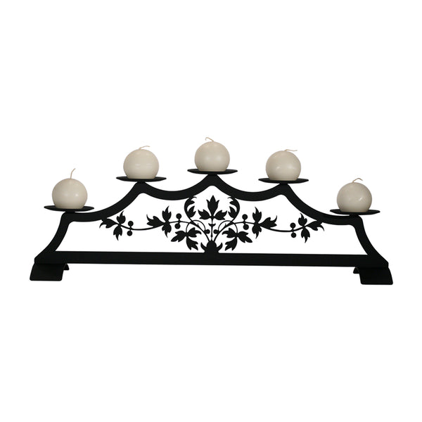 Our Victorian Floral Fireplace Candle Holder will add a touch of Victorian wonder to your home. It has been designed for decorating a fireplace when not in use. It is equally beautiful on a table of any size. Just add our candle holder into a clean fireplace. It is a safe way to light up your home with style and ambience. The black wrought iron features cutouts of flowing floral branches. Size is: 28" wide X 8-1/2" high X 8" deep.