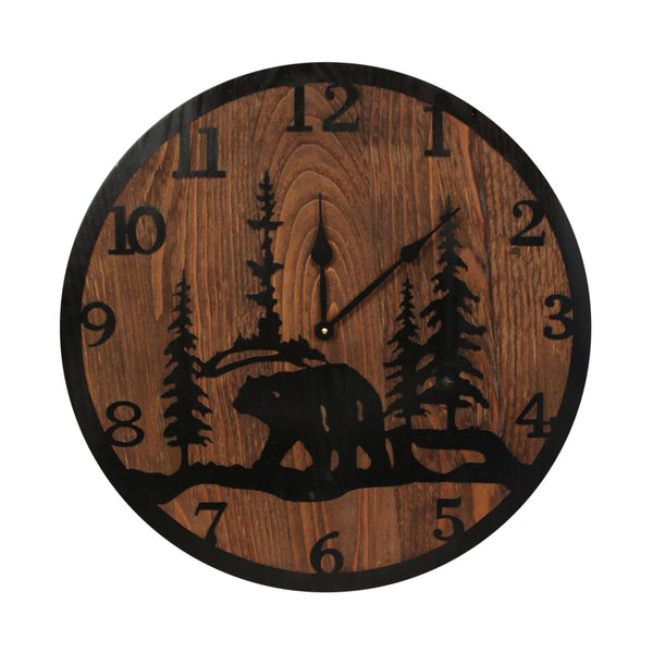 This beautiful piece of wall décor is our Bear Handcrafted Etched Wood Wall Clock (24”) and features an etched image of a bear in the pine trees all in black on a contrasting stained wood background.