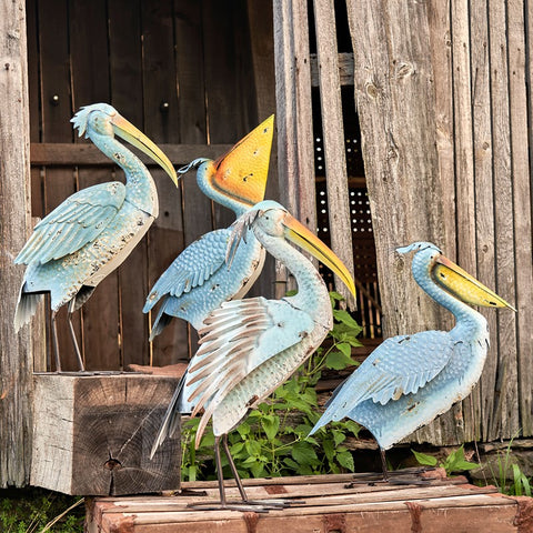 Our Persnickety Pelicans Coastal Inspired Garden Statuary comes as a set of 4. These metal pelican coastal garden birds are crafted from high quality metal, powder coated for added protection against weatherization