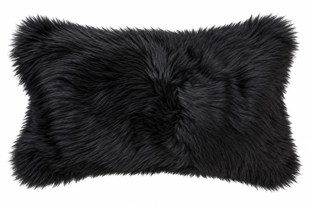 Our black colored New Zealand sheepskin  pillow is soft and and cozy for any room in  your home. 