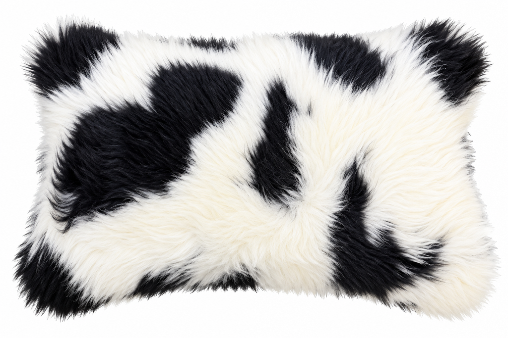 Our black spotted colored New Zealand sheepskin  pillow is soft and and cozy for any room in  your home. 