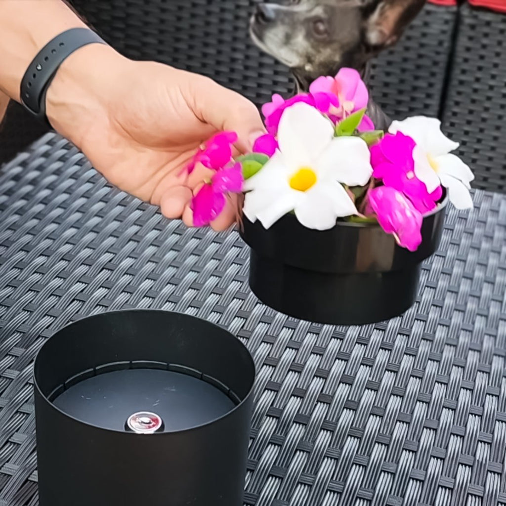 Our Black Secret Safe Flowerpot with Built in Locking Safe allows you to keep something valuable under lock and key. The 2 part flowerpot can discreetly hide small valuables inconspicuously and blends in with household décor without looking out of place. The top of the flowerpot lifts out to reveal a locking 4-3/8” x 2 ½” steel strong box.