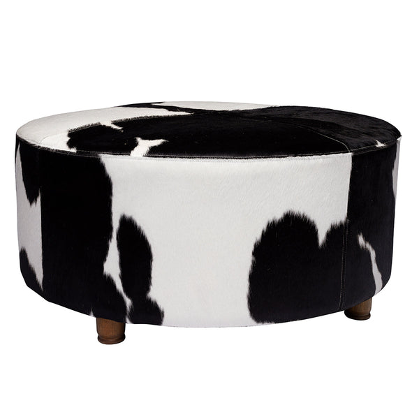 Our Black and White Cloudy Mid Century Cowhide Ottoman is 39” round x 17.5” tall and makes for a comfy piece for putting up your feet, serving food in trays to guests or just sitting and enjoying how comfortable it is. The wooden legs, in a mid century style, add to style and function of this beautiful piece of furniture.
