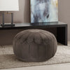 Our Brown Oversized Round Ottoman Pouf is 29.5"W x 29.5"D x 18"H and awaits a special place in your home. It also comes in additional colors: blue, grey, orange, and seafoam.