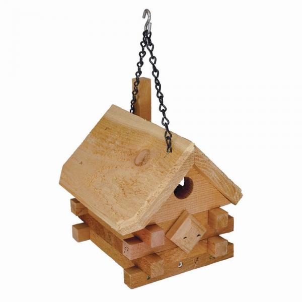 Our Cedar Log Cabin Hanging Wren Birdhouse has been handcrafted here in the USA from natural cedar and will make a great addition to your garden. It comes with a hanging chain to add to a tree branch, shepherds hook, or other means of hanging it up. It has a rustic feel to it, but certainly can be used at any style home. Overall size is: 7.25” (D) x 8.00” (W) x 11.50” (H).