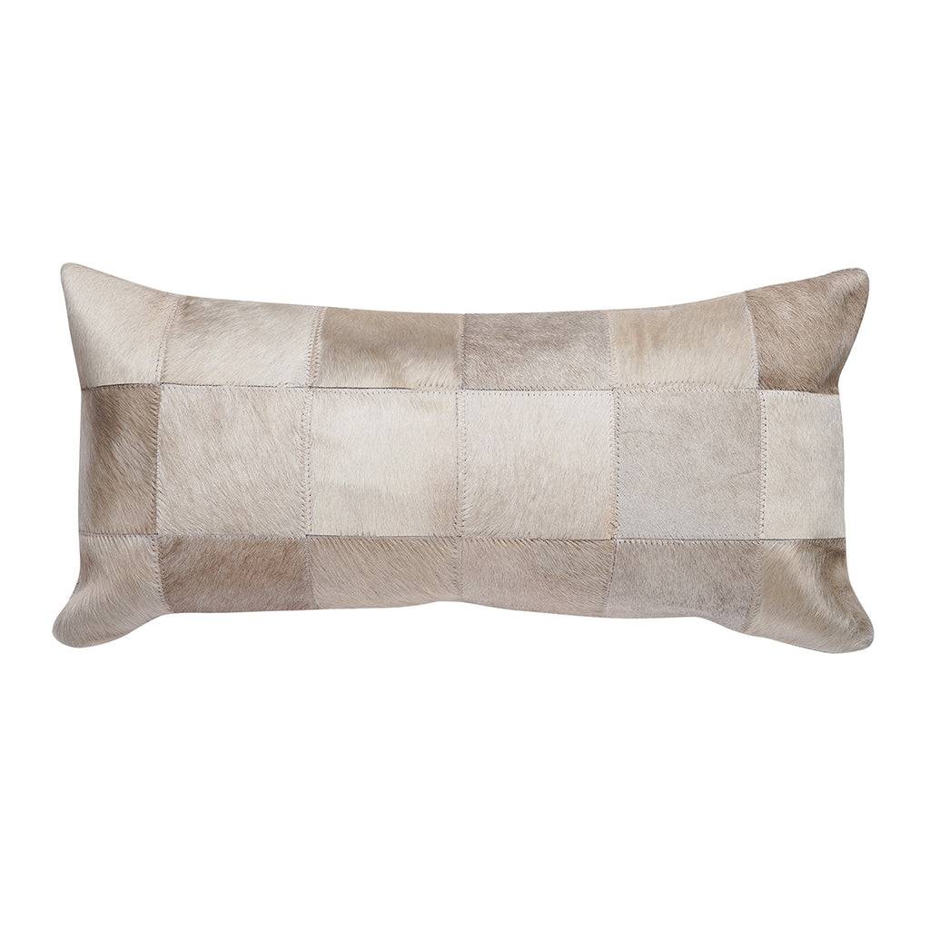 Our Champagne Cowhide Patchwork Lumbar Pillow is 20” long x 12” tall and features an assortment of ivory cowhide colors … all patchworked together to make a decorative pillow.