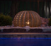 Shown at night, our Golden Barrel Cactus Yard Art Sculpture will make a huge statement in your garden.