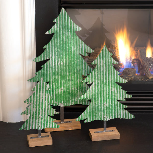 Our Green Corrugated Metal Christmas Trees come as a set of 3 trees in various sizes. They made a room come alive with color and style .