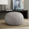 Our Grey Oversized Round Ottoman Pouf is 29.5"W x 29.5"D x 18"H and awaits a special place in your home. It also comes in additional colors: blue, brown, orange, and seafoam.