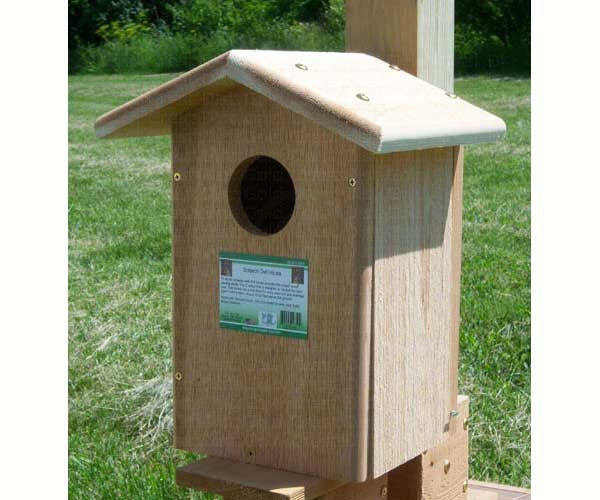 Our Handcrafted Cedar Screech Owl Birdhouse has been handcrafted here in the USA.  This natural cedar screech owl house has been specifically designed and created to provide a home for these birds. The design also includes the proper sized nesting cavity with a 3 inch entry hole just for them.. A gabled roof, proper drainage holes and a side clean-out makes this a must have home for a family of owls. Overall size is:  9.00” (D) x 7.00” (W) x 14.00” (H).
