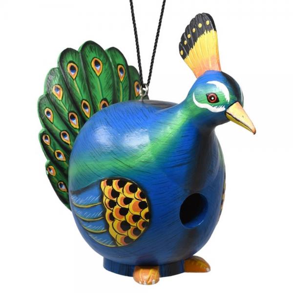 Our Pristine Peacock Hand Carved Wood Birdhouse has been hand carved into a fully functional bird house and then exquisitely hand painted by skillful artisans who have both an eye for detail and creativity.  Wherever you hang this bird house, it will certainly add fun and function to your garden and your birds will love their new home. Size is 5.91” (D) x 9.84” (W) x 9.45” (H).