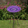 Our Purple  Hues Mosaic Glass Birdbath with Black Metal Stand has been inspired by Audubon and crafted from mosaic glass. It will certainly accentuate your bird sanctuary with its purple colors, as well as provide a classic preening spot for your birds to drink, bathe and get refreshed. It can be used as a birdbath or bird feeder. Overall size is 16.25” in diameter x 24” tall.