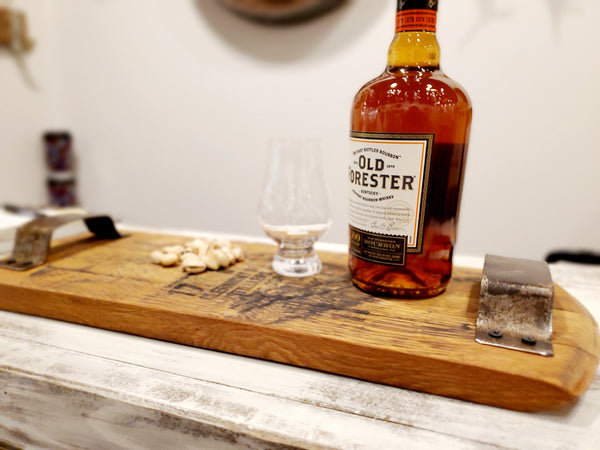 Our Reclaimed Bourbon Head Cheese Tray is handcrafted in the USA from reclaimed and recycled wood bourbon head barrels and features metal bourbon barrel handles and can be purchased with or without your own personal message or original barrel stamp.