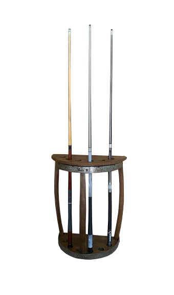 Our Reclaimed Half Round Wine Barrel Head Hanging Pool Cue Rack is custom made to order here in the USA and is 27” tall x 22” wide x 10” deep. Not only will it give you a beautiful and decorative wall hanging for your game room or other space in your home that you want to show off the unique pool cue rack.  The rack is capable of securely holding up to 6 cue sticksIt is available in 4 color stain choices, caramel, pine, weathered or noir.