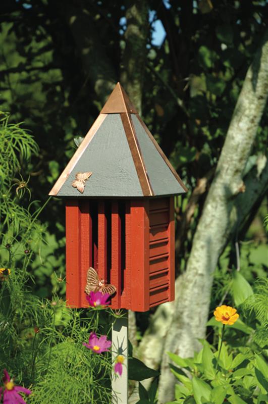 Our Redwood Flutterbye Butterfly House and Garden Stake features two-tone colored garden decor butterfly houses uniquely styled for you and your butterflies. Made in the USA of select cypress siding, solid copper hipped roof with authentic corner boards, slotted front for the butterflies to enter and finished with copper butterfly adornments to add additional decorative detail.  