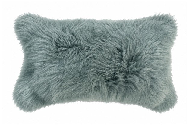 Our seafoam colored New Zealand sheepskin  pillow is soft and and cozy for any room in  your home. 