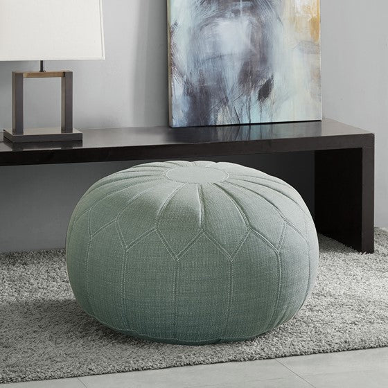 Our Seafoam Oversized Round Ottoman Pouf is 29.5"W x 29.5"D x 18"H and awaits a special place in your home. It also comes in additional colors: blue, brown, orange, and grey.