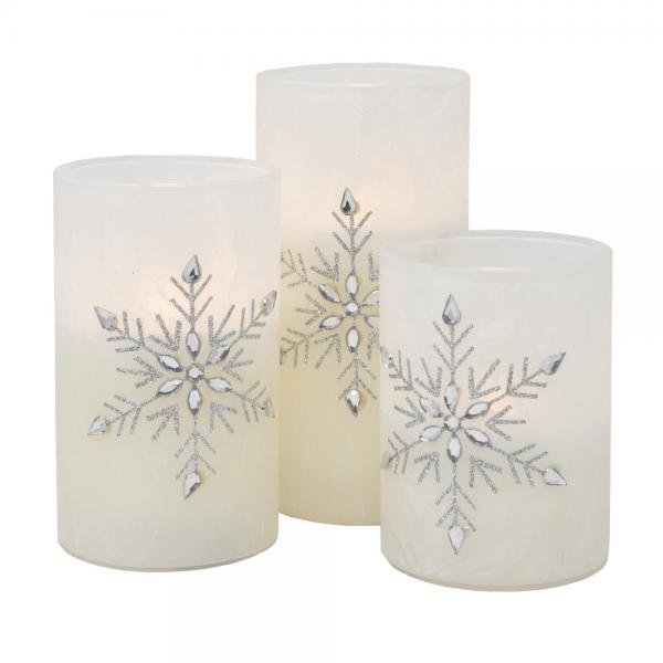 Our Snowflake LED Candle Set comes as a set of 3 candles in sizes of one each of  4, 5, and 6 inch pillars that are 3 inch diameter. They will charm, warmth and a beautiful glow to your home. The candles feature a warm white LED that flickers like a real candlelight. Comes with an automatic 6 hour timer. Each candle operates on 3 AAA battery (not included.) 