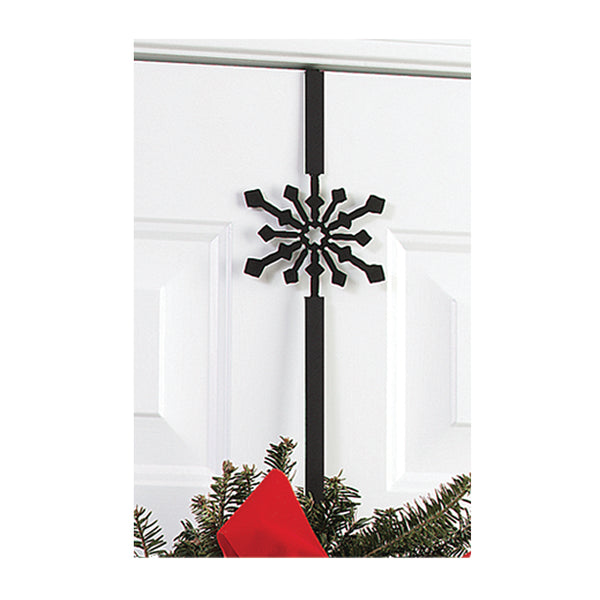 Our Snowflake Wrought Iron Wreath Holder is handcrafted in the USA and decorative for year round use indoors or outdoors. It features a silhouette of a snowflake and makes a great addition to any home décor, rustic, country, modern and coastal styles. It is 13” in length x 4” wide and fits a door up to and including a 1-3/4” door thickness.