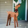 Our Handcrafted Wooden Reindeer Statue has been handcrafted here in the USA of precision cut wood and easily assembles like a wooden puzzle. This interlocking reindeer is sure to become a beloved Christmas character year after year. Size is 32"L x 19.75"W x 51"H and weighs 19 pounds once assembled.