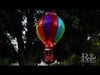 Video of our breathtakingly beautiful Solar LED Powered Hot Air Balloon Lantern features hand-painted glass panels of multi-colored hues, plus a string of flicker-happy LED lights, this lantern looks like a real hot air balloon. Hang it up and watch it glow for 6-8 hours with the included replaceable rechargeable batteries. Size is 7.5'' x 7.5'' x 23.5'' tall.