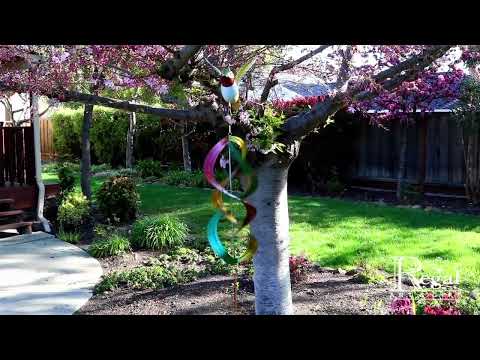 Video of  Ruby Throated 3D Wind Spinner  made of metal and glass. inthegardenandmore.com