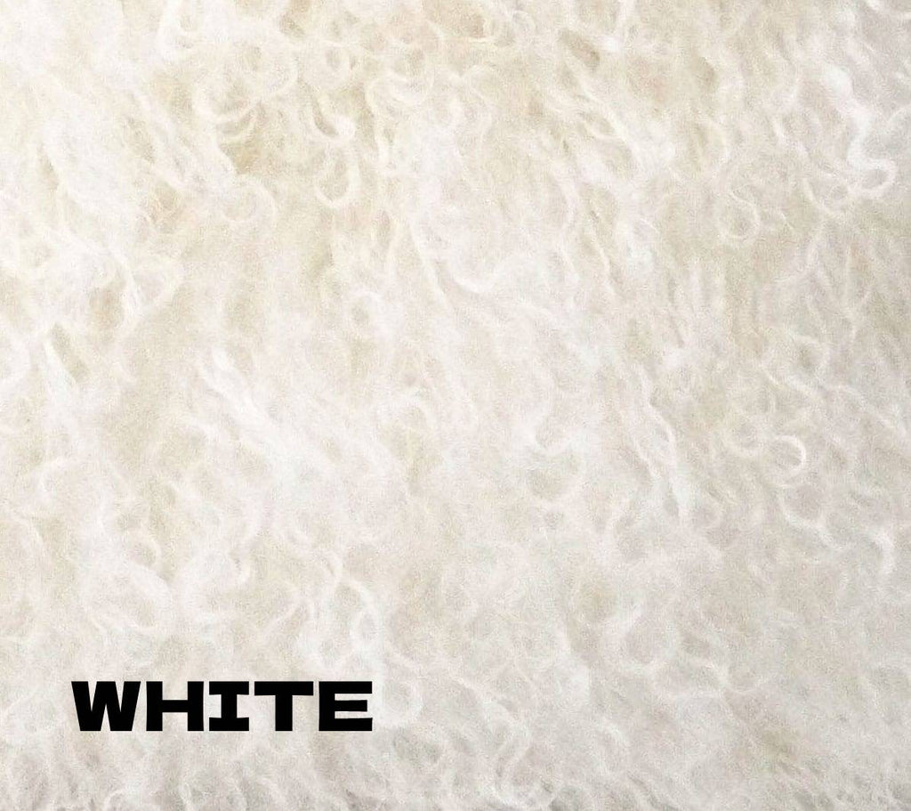 Add color and softness to your home with our 20" square White colored Tibetan/Mongolian Lamb Fur Pillow