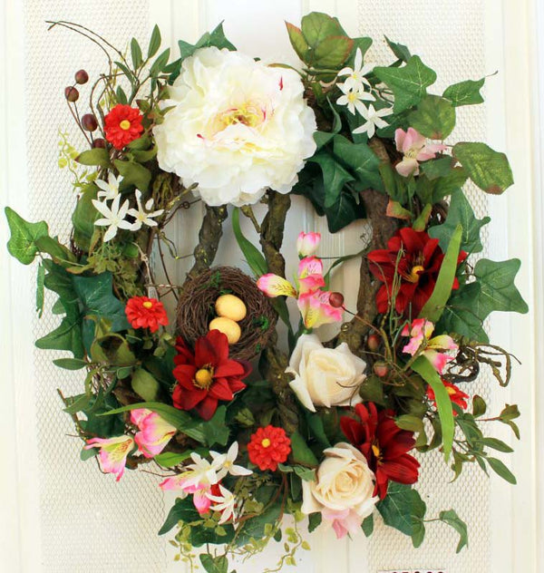 This lovely Bird’s Nest With Florals Decorative Front Door Wreath (23 inch) features a bird's next intertwined with the flowers 