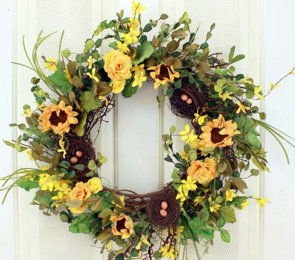 This lovely Bird’s Nests Among the Sunflowers Decorative Front Door Wreath (23 inch) features 3 sets of bird's nest intertwined in the sunflowers