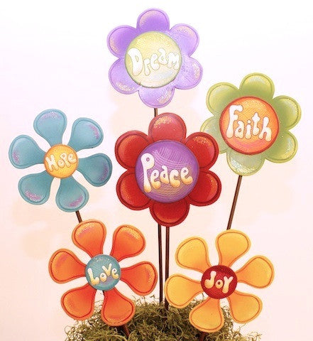 Add fun and color to your garden or bring them inside your home. These heavy duty metal  Praise Petal Daisies Metal Garden Stake Statuary/Wall Decor (set of 6) will add inspiration and color to both spaces.
