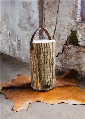 Our Ash Wood Tree Stump Luminary Lantern Table (shown medium size with leather strap) is available in 3 styles, these authentic reclaimed and repurposed wood tree stumps have been handcrafted with spaced cut grooves around the diameter to allow light to show through.   Each stump has been given a second life from wood that otherwise would have been discarded. So sustainable these wood stumps are! Each one easily plugs into your electrical outlet and great for indoor use or on a protected patio.