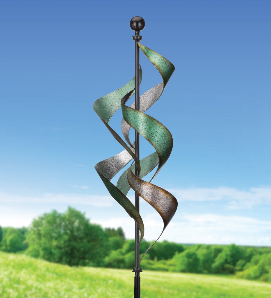 garden of motion with this kinetic, heavy duty, wind spinner which features a thick metal pole with multiple blades of cascading ribbons encircling the pole with sublime vertical movement… even with the slightest breeze