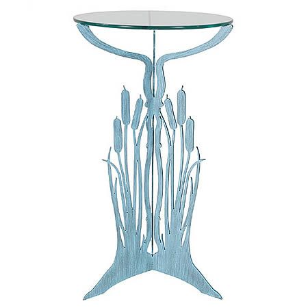 Our Cattails Pedestal Table Metal Art Sculpture is a stately piece hand forged here in the USA by skilled artisans. Fabricated by hand with the use of 3/16” heavy gauge steel, then zinc galvanized to prevent rusting, and hand painted with a two-step high quality marine grade epoxy paint for weather resistant indoor or outdoor use. The very sturdy tri-legged cattails pedestal base, once hand painted in soothing verdigris color, is fitted with a 19” in diameter 3/8” piece of flat glass. 