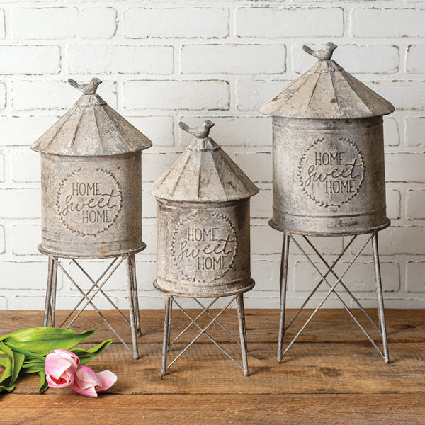 Our Country Farmhouse Silo Metal Containers (Set of 3) features three large silos that will enable you to store items you may not need or want out and decorate with your farmhouse style at the same time