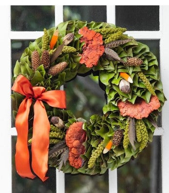 Our Delightfully Fall Dried and Preserved Magnolia Wreath is available in 3 sizes 18’, 23” and 28”.  Handcrafted here in the USA, each magnolia leaf is cut fresh, then dried and turned and placed onto this wreath to give it an abundance of fullness. It features an assortment of dried mushrooms mixed with verdant millet and feathers are added, along with a lovely festive colored fall bow.  