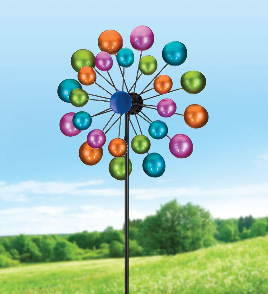 Add color and motion to your garden with our new Double Rotating Wind Cups of Color Kinetic Wind Spinner. It is 19" in diameter x 8" deep x 70" tall and is sure to mesmerizing with color and motion.
