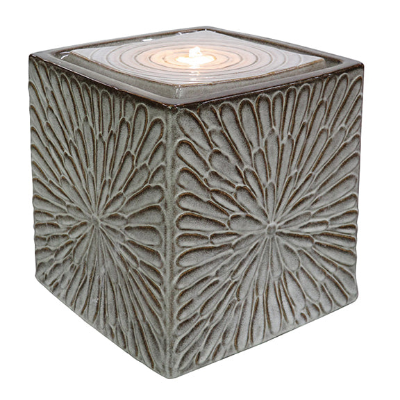 Our Embossed Ceramic Dahlia Square Fountain is an elegant, fully self-contained ceramic fountain with embossed dahlia will add color and tranquility to your patio, deck, or elsewhere in your home or garden. It includes a pump with LED light to enhance its beauty. Our glazed fountains are created by skilled artisan who have an eye for detail and a love for their craft.. Water will beautifully bubble and cascade down into the bowl below. Overall size is: 14” square x 14.75” high.