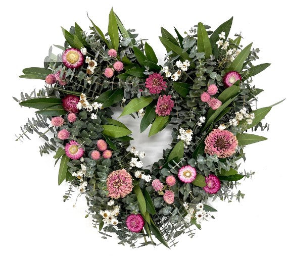 resh Eucalyptus and Dried and Preserved Florals Heart Wreath is 20” in size and features a mixture of fresh eucalyptus and dried and preserved natural yarrow, statice, globes and faux pink roses. Each wreath is handmade to perfection and flowers grown and preserved here in the USA.