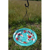 Our Swimming Koi Fish Hanging Glass Birdbathfeatures a decorative and vibrant glass birdbath bowl with textured bottom. The bowl is crafted from durable, heavy duty textured glass and is outdoor safe and fade resistant. The bowl comes with hooks that enable you to hang this birdbath and easily take down for cleaning purposes. Size is 16.5” tall x 13” in diameter.  