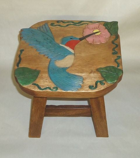 Our Hummingbird Wood Footstool has been beautifully hand carved, painted and stained with amazing detail