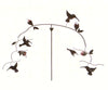 Our Hummingbirds Metal Kinetic Balance Garden Stake / Mobile will add function and fun to your garden. This handcrafted multi-functional metal garden decoration features hummingbirds on both ends of the balance bar and it is a fun piece to display outdoors or indoors if you so choose. The entire piece has been powder coated for weather resistant use.