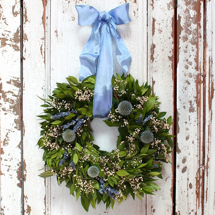 Our freshly made It's A Boy Fresh and Fragrant Wreath – 10" will make a great gift for a baby's room
