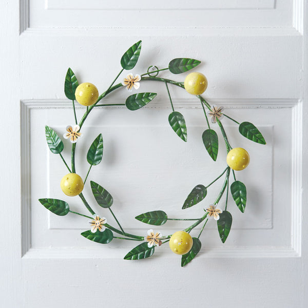 Our Lemon and Leaves Indoor or Outdoor Metal Wreath will add a fresh touch to your front door or interior wall this summer and beyond. Mades just a few lemon tree blossoms added too. The cheerful colors are great as kitchen wall décor or as bathroom wall décor, in addition to front door of metal and painted in bright lemon yellow and green colors, it also featur curb appeal. Size is 13'' dia. x 2½''H.