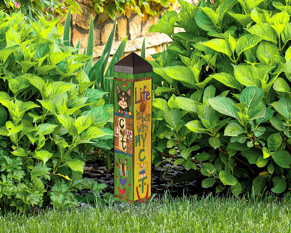 Our Life is Best With My Cat Decorative Obelisk Garden Yard Art Post is made in the USA and features an ultra-durable, maintenance free PVC post that has been wrapped with one of our bright automobile grade, all weather, vinyl artwork pieces to create a yard art sculpture that creates the ultimate WOW factor. Each colorful piece has a message that is inspiring and fun and will be so well loved in your garden. Size is 20” tall x 4” square.