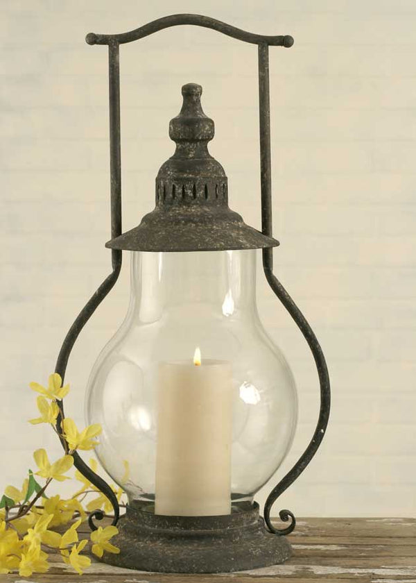 Add your Country Rustic Metal and Glass Candle Lantern in our Dark Grey Finish to your home and add warmth and ambiance 
