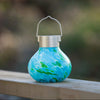 Our Mint Hand Blown Glass Solar Tea Lantern is 5.5″ tall x 4.5″ wide and has been crafted by skilled artisans using hand blown glass techniques that create such eye catching detail 